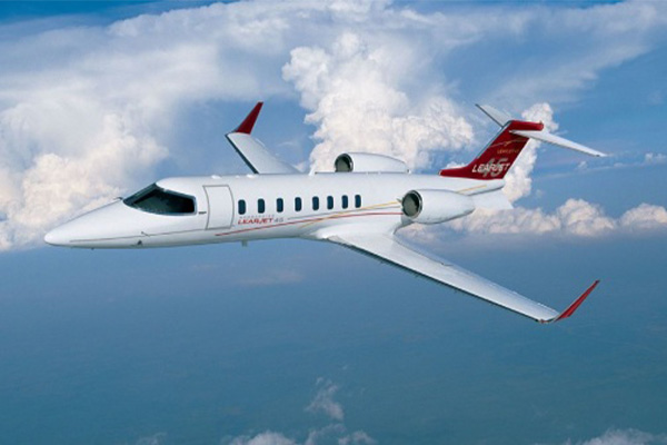 midsize jets for sale - Learjet 45 in sky